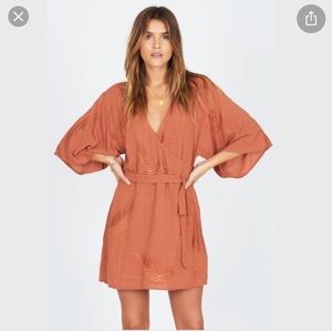 Burnt orange embroidered wrap dress